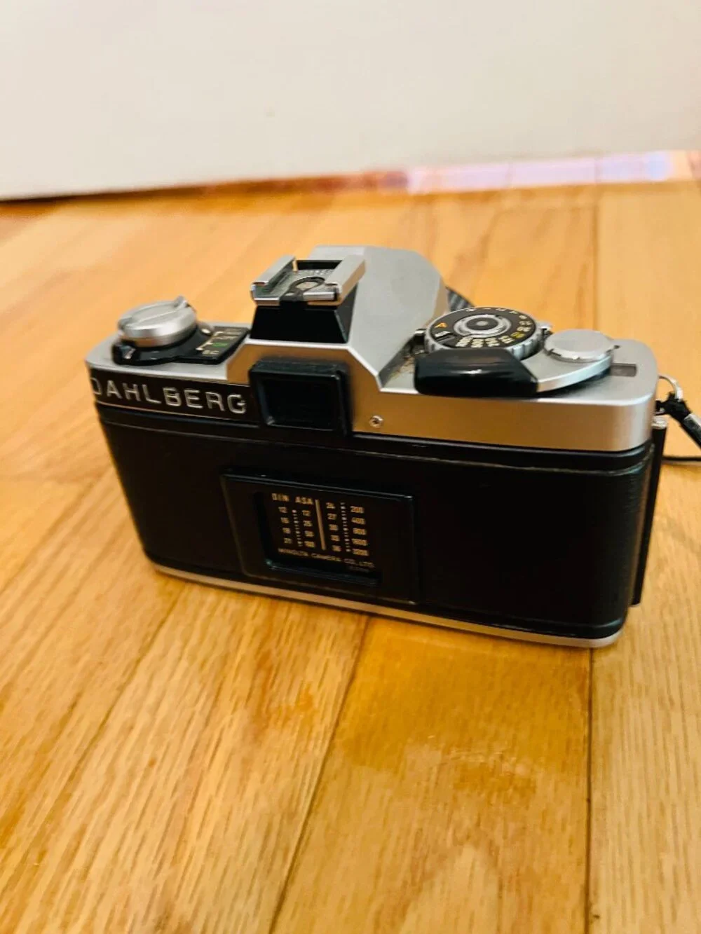 vintage Minolta XG-9 35mm SLR film camera equipped with a 50mm prime lens